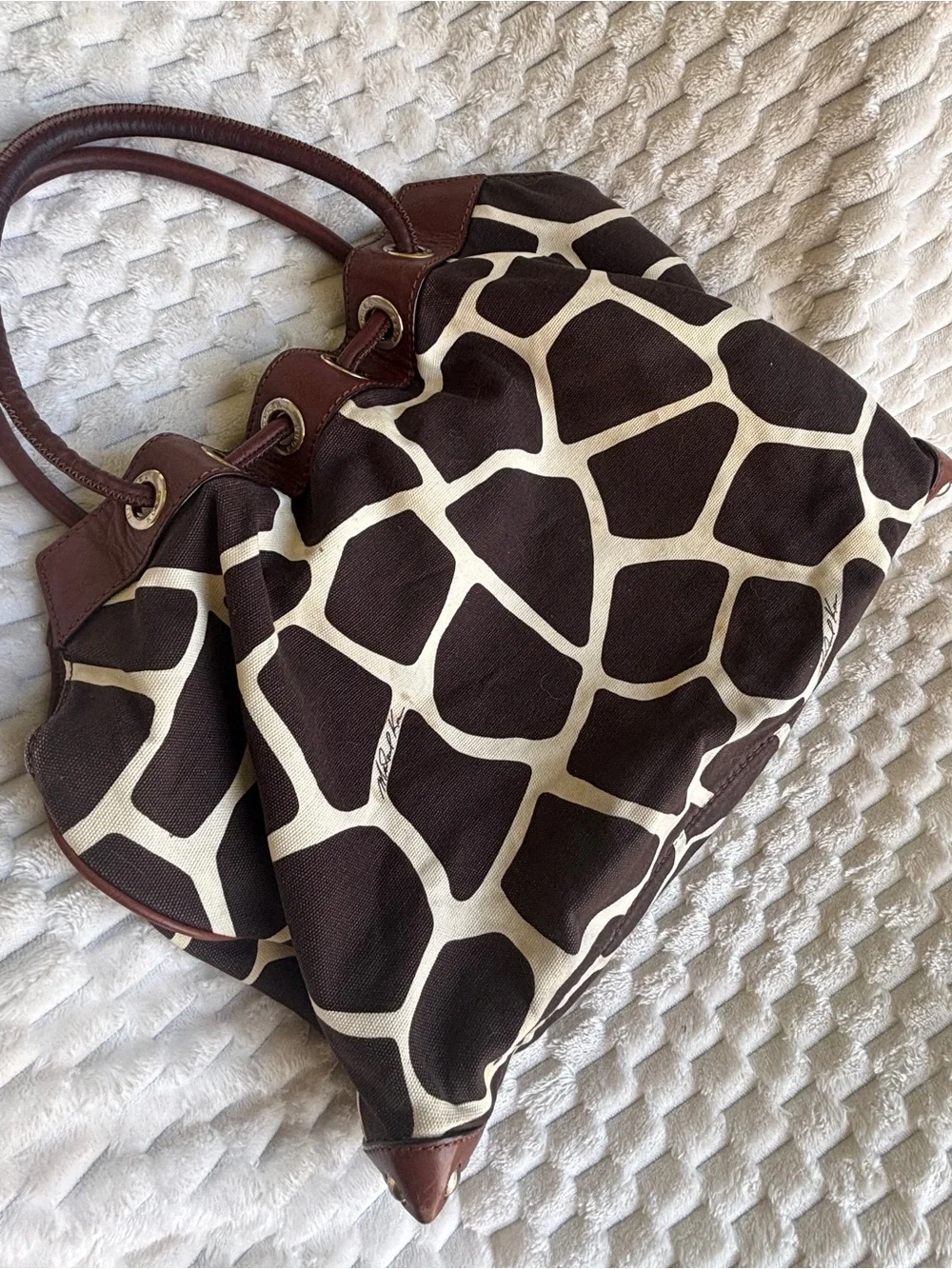 Michael Kors giraffe print canvas, leather trim designer, Gromit detail